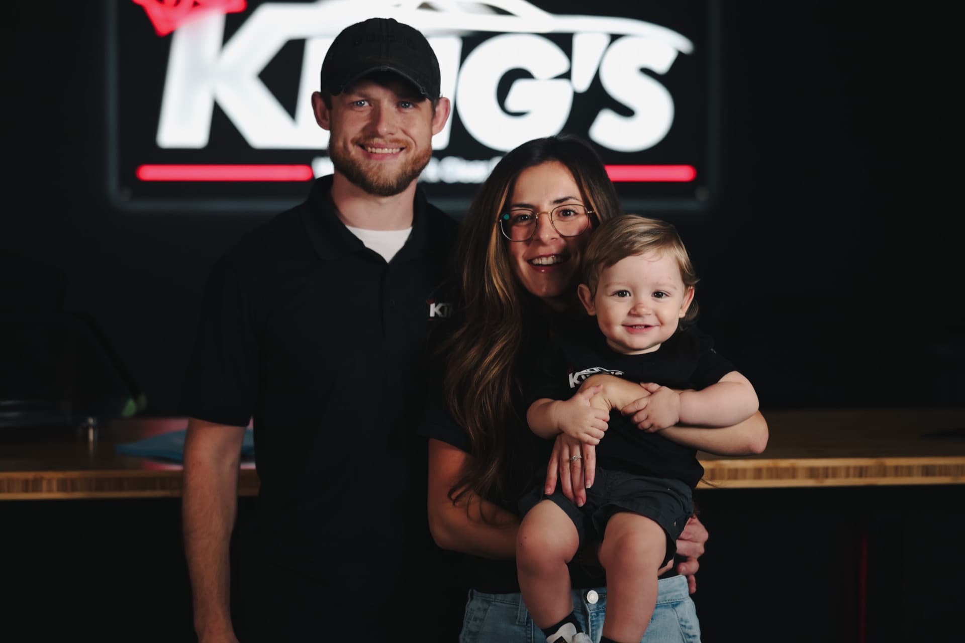 The King family inside the shop